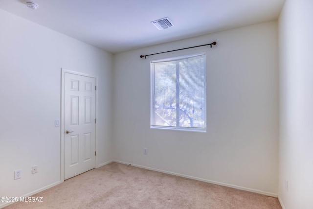 8348 N Mountain Stone Pine Way, Tucson, AZ 85743 - spare room featuring light colored carpet and a smoke detector