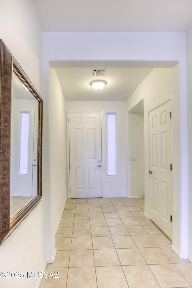 8348 N Mountain Stone Pine Way, Tucson, AZ 85743 - foyer entrance featuring light tile patterned floors and healthy amount of natural light