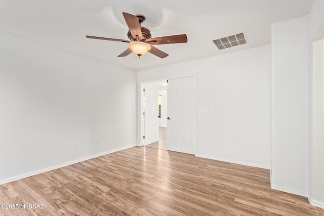 3969 E Agate Knoll Dr, Tucson, AZ 85756 - spare room featuring ceiling fan and light wood-style floors