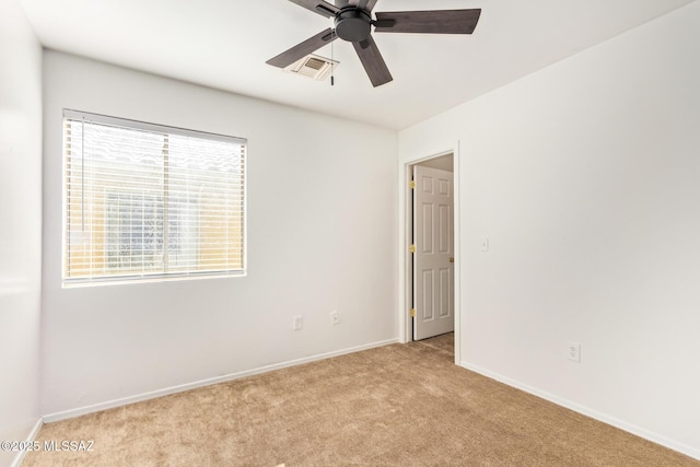 3969 E Agate Knoll Dr, Tucson, AZ 85756 - unfurnished room with light carpet, healthy amount of natural light, and ceiling fan