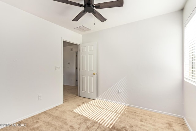 3969 E Agate Knoll Dr, Tucson, AZ 85756 - carpeted spare room with ceiling fan and baseboards