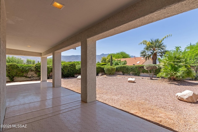 64161 E Santa Catalina Ct, Saddlebrooke, AZ 85739 - fenced backyard with a mountain view and a patio area