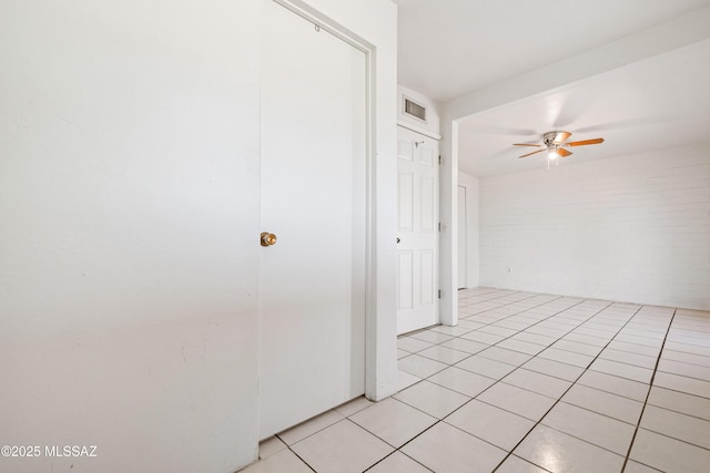 1818 E Mitchell St, Tucson, AZ 85719 - spare room with a ceiling fan and light tile patterned floors