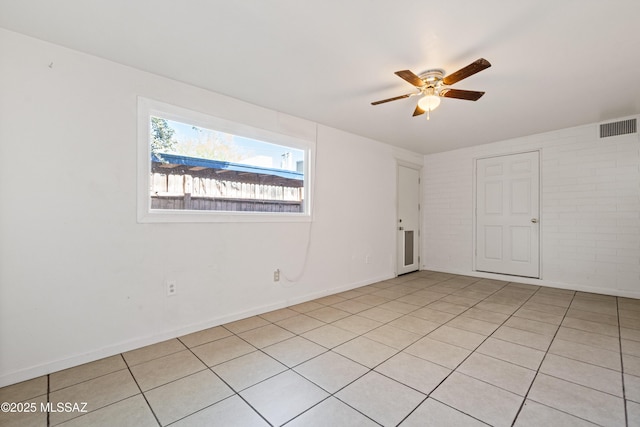 1818 E Mitchell St, Tucson, AZ 85719 - spare room with a ceiling fan and light tile patterned flooring