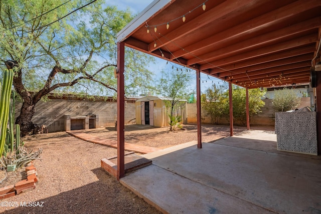 1818 E Mitchell St, Tucson, AZ 85719 - fenced backyard with a storage shed and a patio