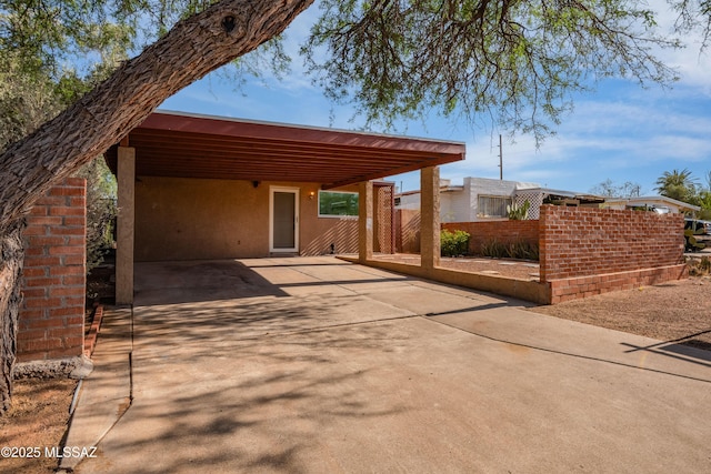 1818 E Mitchell St, Tucson, AZ 85719 - view of patio with driveway