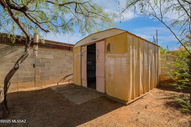 1818 E Mitchell St, Tucson, AZ 85719 - view of shed with a fenced backyard