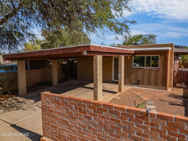 1818 E Mitchell St, Tucson, AZ 85719 - view of front of home with a carport