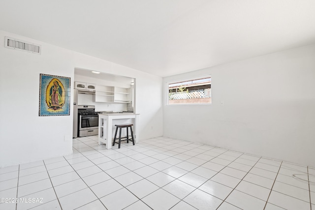 1818 E Mitchell St, Tucson, AZ 85719 - living room featuring light tile patterned floors
