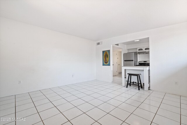 1818 E Mitchell St, Tucson, AZ 85719 - living area with light tile patterned floors