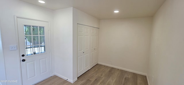 2215 E Bantam Rd, Tucson, AZ 85706 - doorway to outside with light wood-type flooring and recessed lighting