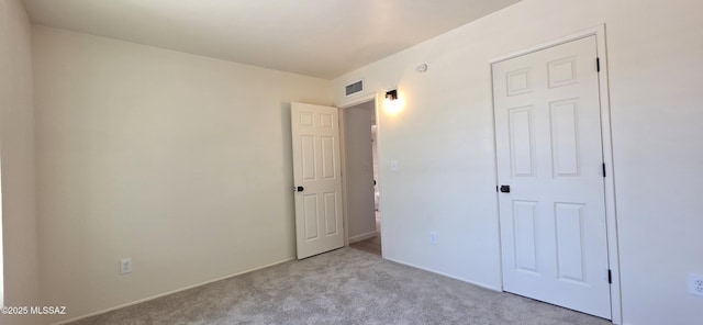 2215 E Bantam Rd, Tucson, AZ 85706 - unfurnished bedroom featuring carpet flooring