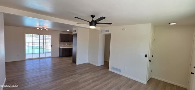 2215 E Bantam Rd, Tucson, AZ 85706 - empty room featuring light wood-style floors and ceiling fan