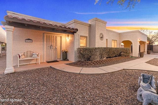 5760 S Stewart Blvd, Tucson, AZ 85706 - pueblo-style home with stucco siding