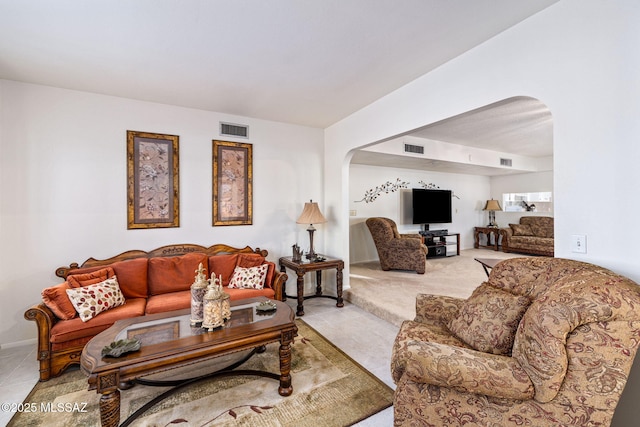 5760 S Stewart Blvd, Tucson, AZ 85706 - carpeted living area featuring arched walkways