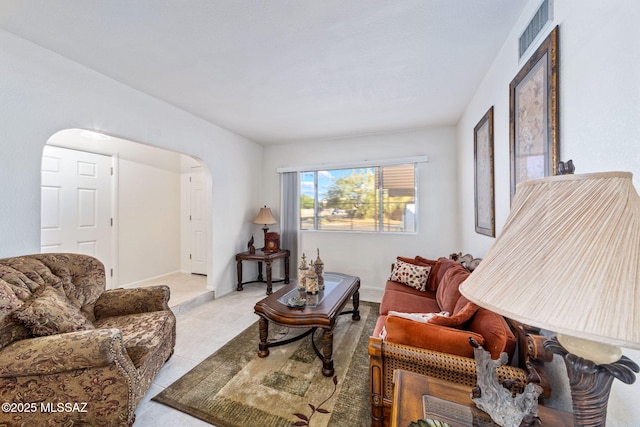 5760 S Stewart Blvd, Tucson, AZ 85706 - tiled living room with arched walkways