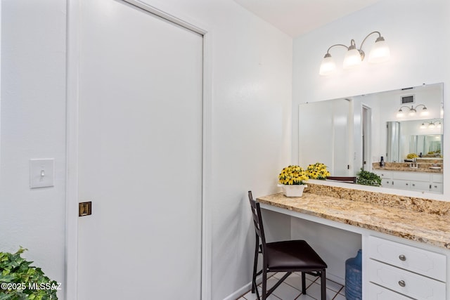 5760 S Stewart Blvd, Tucson, AZ 85706 - bathroom featuring vanity and tile patterned floors