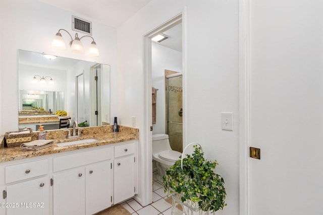 5760 S Stewart Blvd, Tucson, AZ 85706 - full bath with a shower stall, vanity, and tile patterned floors