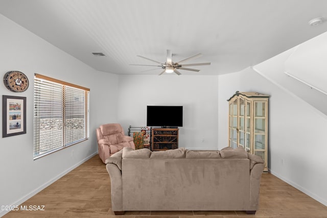 977 S Limestone St, Benson, AZ 85602 - living area featuring a ceiling fan and light wood-style flooring