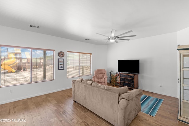 977 S Limestone St, Benson, AZ 85602 - living area featuring wood finished floors and a ceiling fan