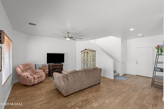 977 S Limestone St, Benson, AZ 85602 - living area with light wood-style flooring, stairs, ceiling fan, and recessed lighting