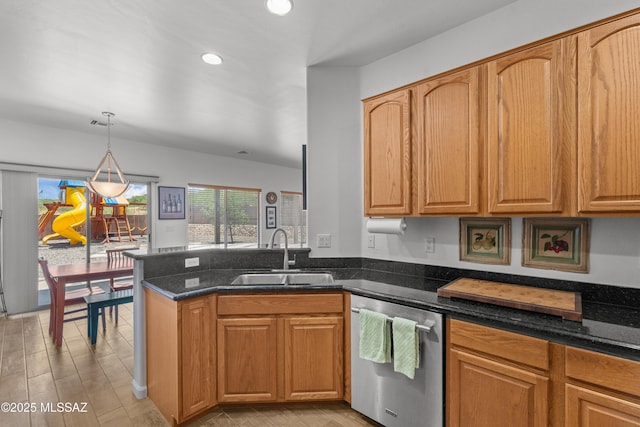 977 S Limestone St, Benson, AZ 85602 - kitchen featuring dishwasher, a peninsula, dark stone countertops, recessed lighting, and decorative light fixtures