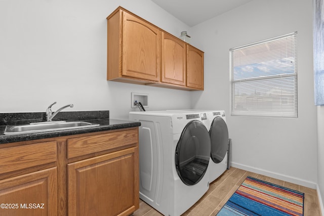 977 S Limestone St, Benson, AZ 85602 - laundry area with cabinet space, independent washer and dryer, and wood finish floors