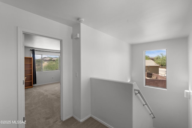 977 S Limestone St, Benson, AZ 85602 - hallway featuring an upstairs landing, plenty of natural light, and carpet floors