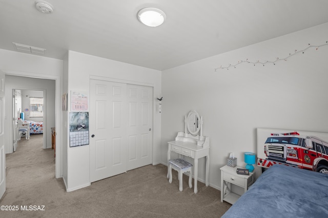 977 S Limestone St, Benson, AZ 85602 - bedroom featuring light colored carpet and a closet