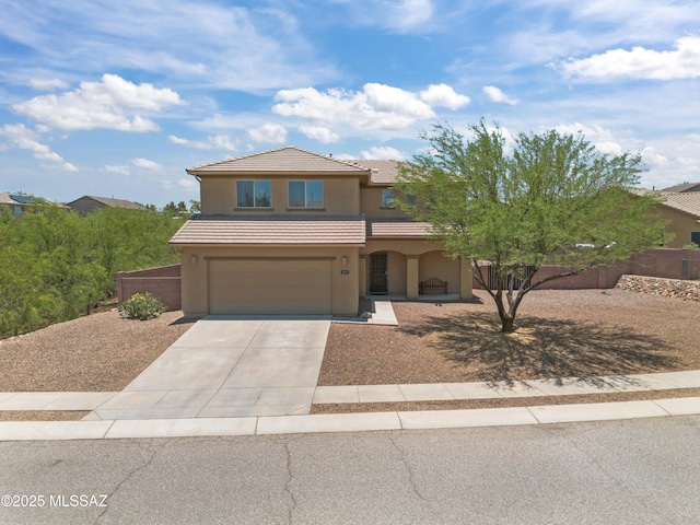 977 S Limestone St, Benson, AZ 85602 - traditional-style house with stucco siding, an attached garage, driveway, and a tile roof