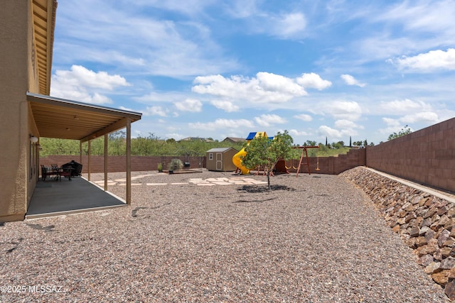 977 S Limestone St, Benson, AZ 85602 - fenced backyard featuring a patio area and a shed