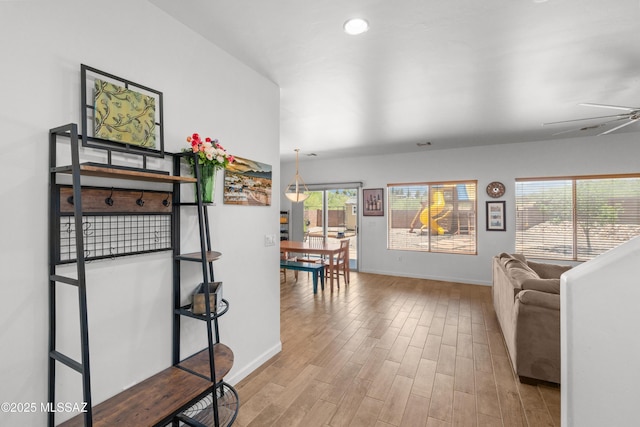 977 S Limestone St, Benson, AZ 85602 - corridor with wood finished floors and baseboards