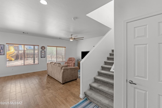 977 S Limestone St, Benson, AZ 85602 - staircase featuring a ceiling fan and wood finished floors