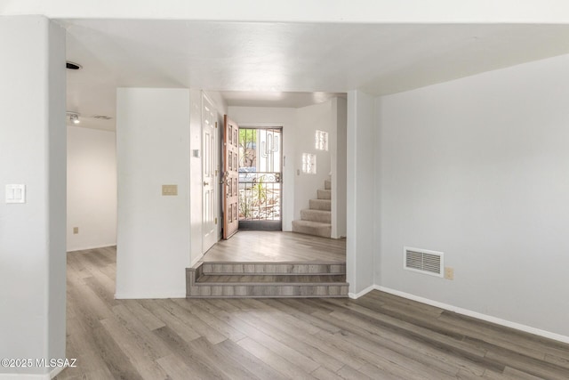 467 S Stephanie Loop, Tucson, AZ 85745 - foyer entrance with wood finished floors and stairway