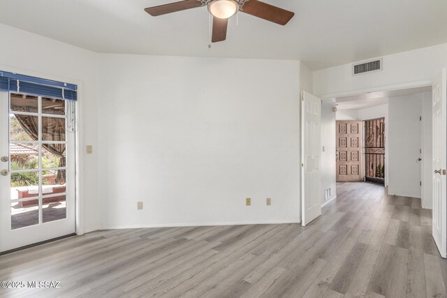 467 S Stephanie Loop, Tucson, AZ 85745 - unfurnished room with light wood-style flooring and a ceiling fan