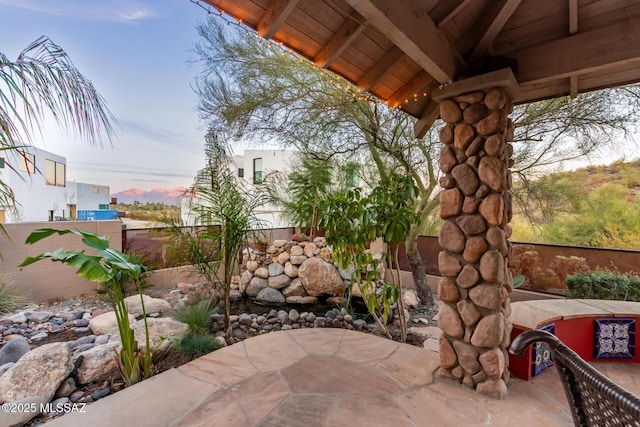 467 S Stephanie Loop, Tucson, AZ 85745 - patio terrace at dusk featuring a patio and a fenced backyard