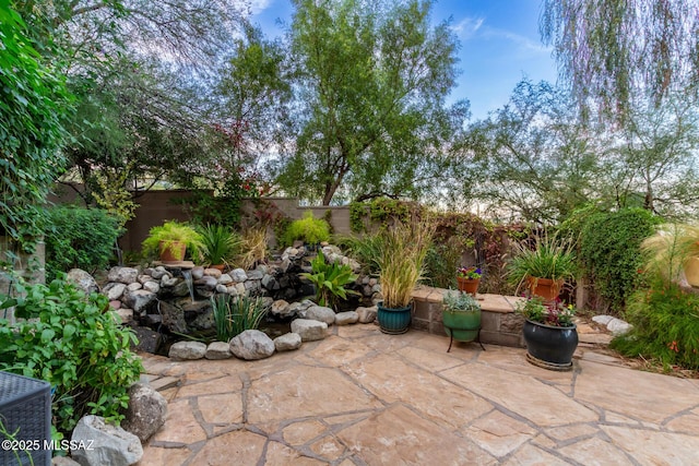 467 S Stephanie Loop, Tucson, AZ 85745 - fenced backyard with a patio area