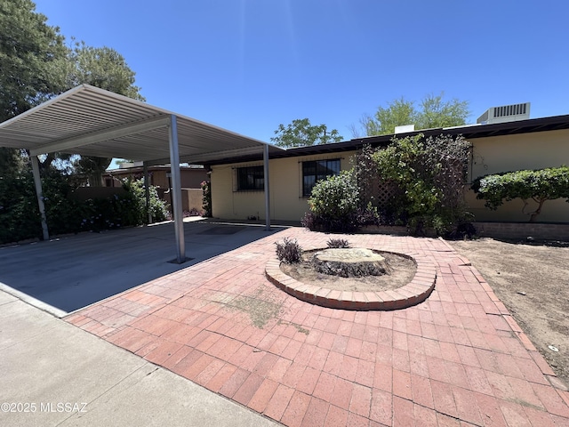 1339 W Pastime Rd, Tucson, AZ 85705 - view of patio / terrace with a carport