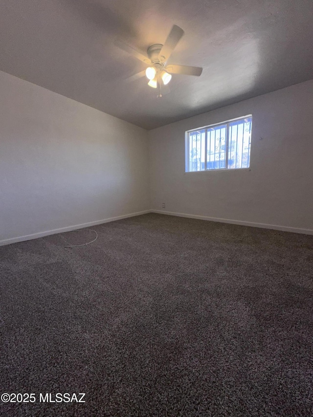 1339 W Pastime Rd, Tucson, AZ 85705 - carpeted empty room with ceiling fan and baseboards