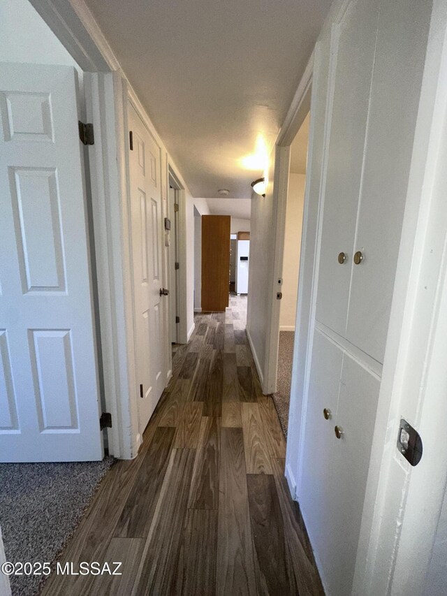 1339 W Pastime Rd, Tucson, AZ 85705 - hallway featuring wood finished floors and baseboards