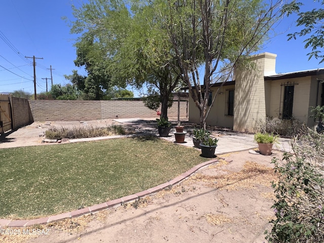 1339 W Pastime Rd, Tucson, AZ 85705 - fenced backyard featuring a patio