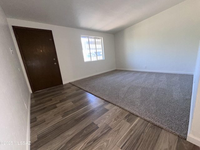 1339 W Pastime Rd, Tucson, AZ 85705 - unfurnished room with wood finished floors and baseboards