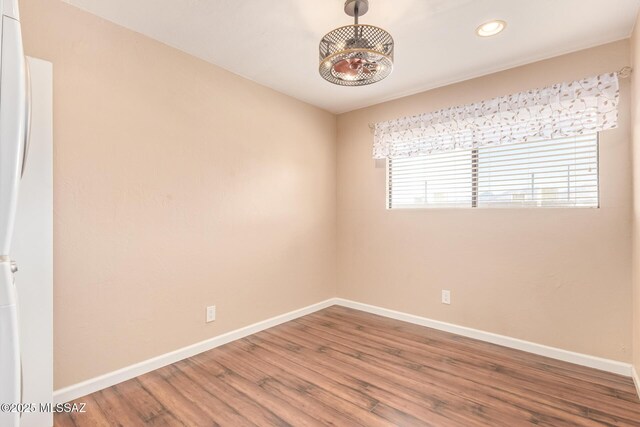 1312 S Avenida Polar Unit A6, Tucson, AZ 85710 - unfurnished room with wood finished floors and recessed lighting