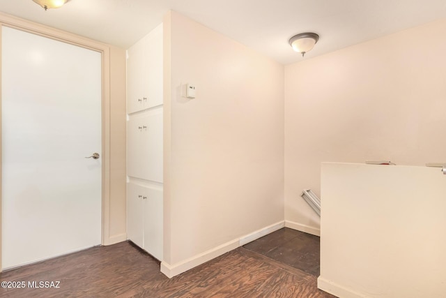 1312 S Avenida Polar Unit A6, Tucson, AZ 85710 - washroom with dark wood-style flooring and baseboards