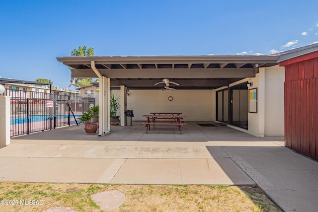 1312 S Avenida Polar Unit A6, Tucson, AZ 85710 - view of patio / terrace featuring a community pool and a ceiling fan