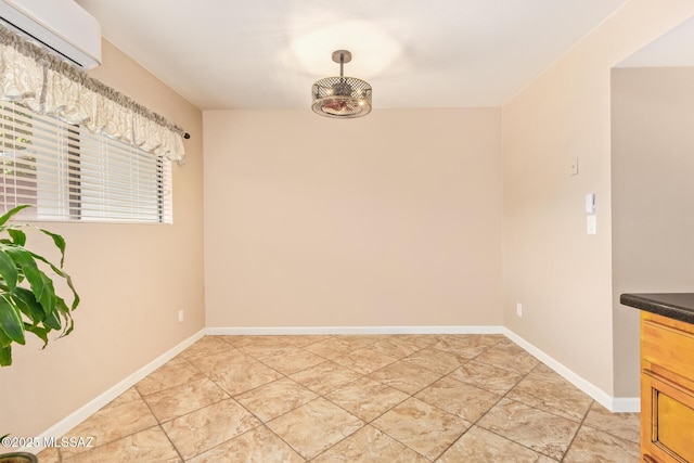 1312 S Avenida Polar Unit A6, Tucson, AZ 85710 - unfurnished dining area with a wall unit AC and baseboards