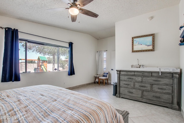 6075 N Applesauce Ct, Tucson, AZ 85741 - bedroom with light tile patterned floors, multiple windows, a textured ceiling, and a ceiling fan