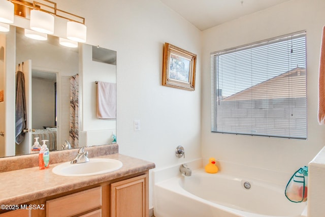 6075 N Applesauce Ct, Tucson, AZ 85741 - bathroom featuring vanity and a garden tub