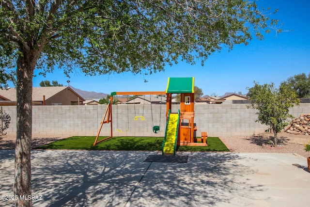 6075 N Applesauce Ct, Tucson, AZ 85741 - view of jungle gym featuring a fenced backyard and a patio