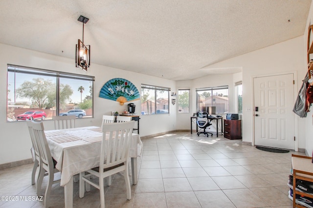 6075 N Applesauce Ct, Tucson, AZ 85741 - dining space featuring a textured ceiling, light tile patterned floors, and a desk